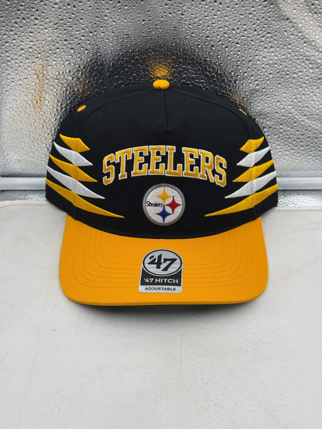 Pittsburgh Steelers NFL '47 Brand Black TT Diamond Hitch Snapback Adjustable Hat displayed on a white background showcasing the bold team logo and sleek black design.