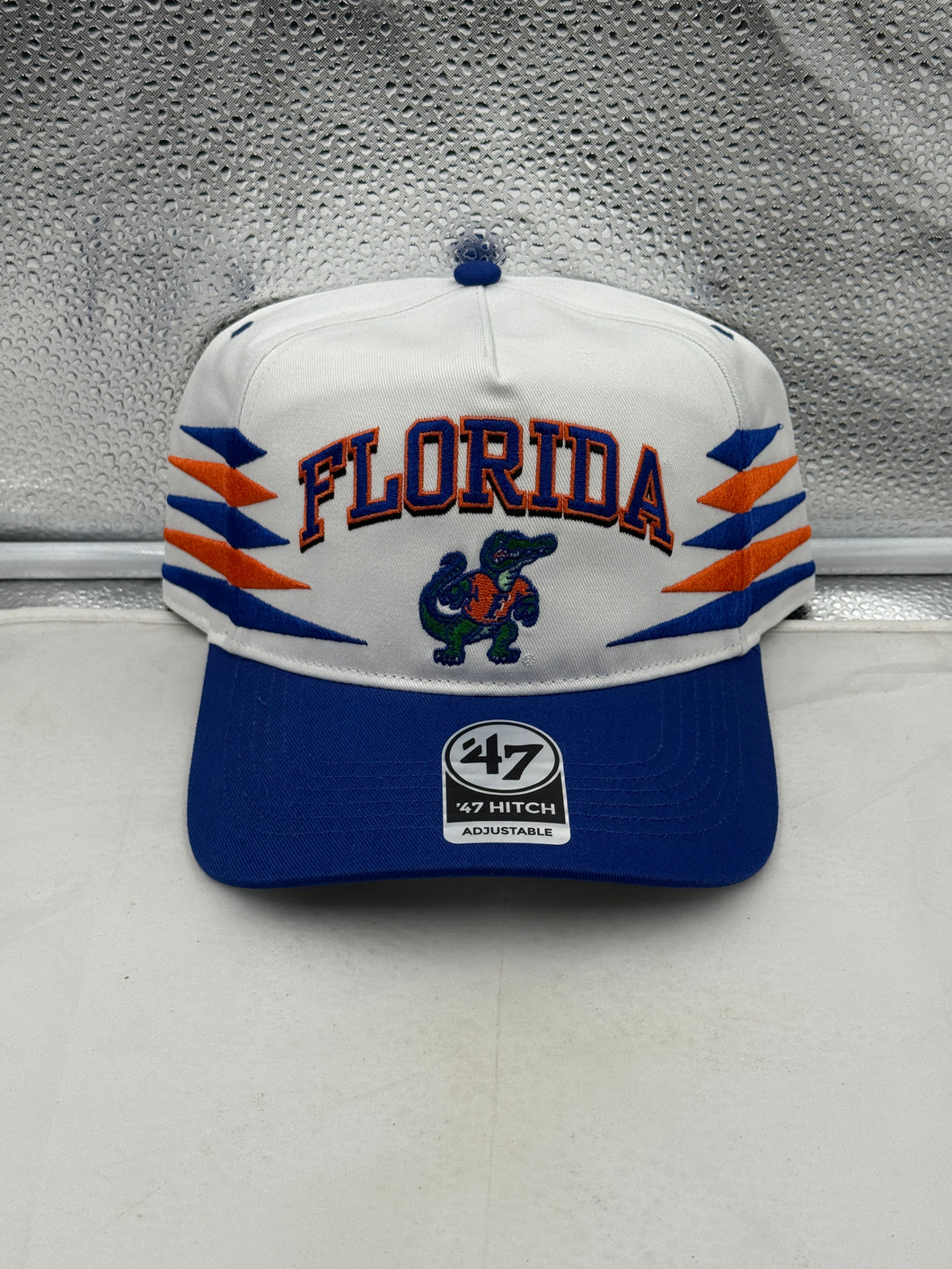 Florida Gators NCAA '47 Brand White TT Diamond Hitch Snapback Adjustable Hat showcasing the iconic team logo on a vibrant white background.