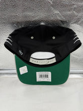 Load image into Gallery viewer, Las Vegas Raiders NFL &#39;47 Brand Black TT Diamond Hitch Snapback Adjustable Hat worn by a fan, representing team pride at a game.
