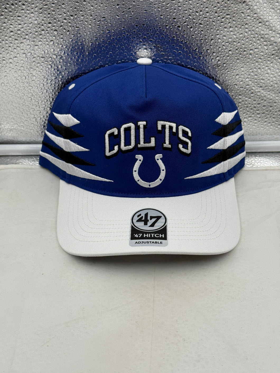 Indianapolis Colts NFL '47 Brand Black TT Diamond Hitch Snapback Adjustable Hat front view showcasing its unique diamond design and adjustable snapback feature.