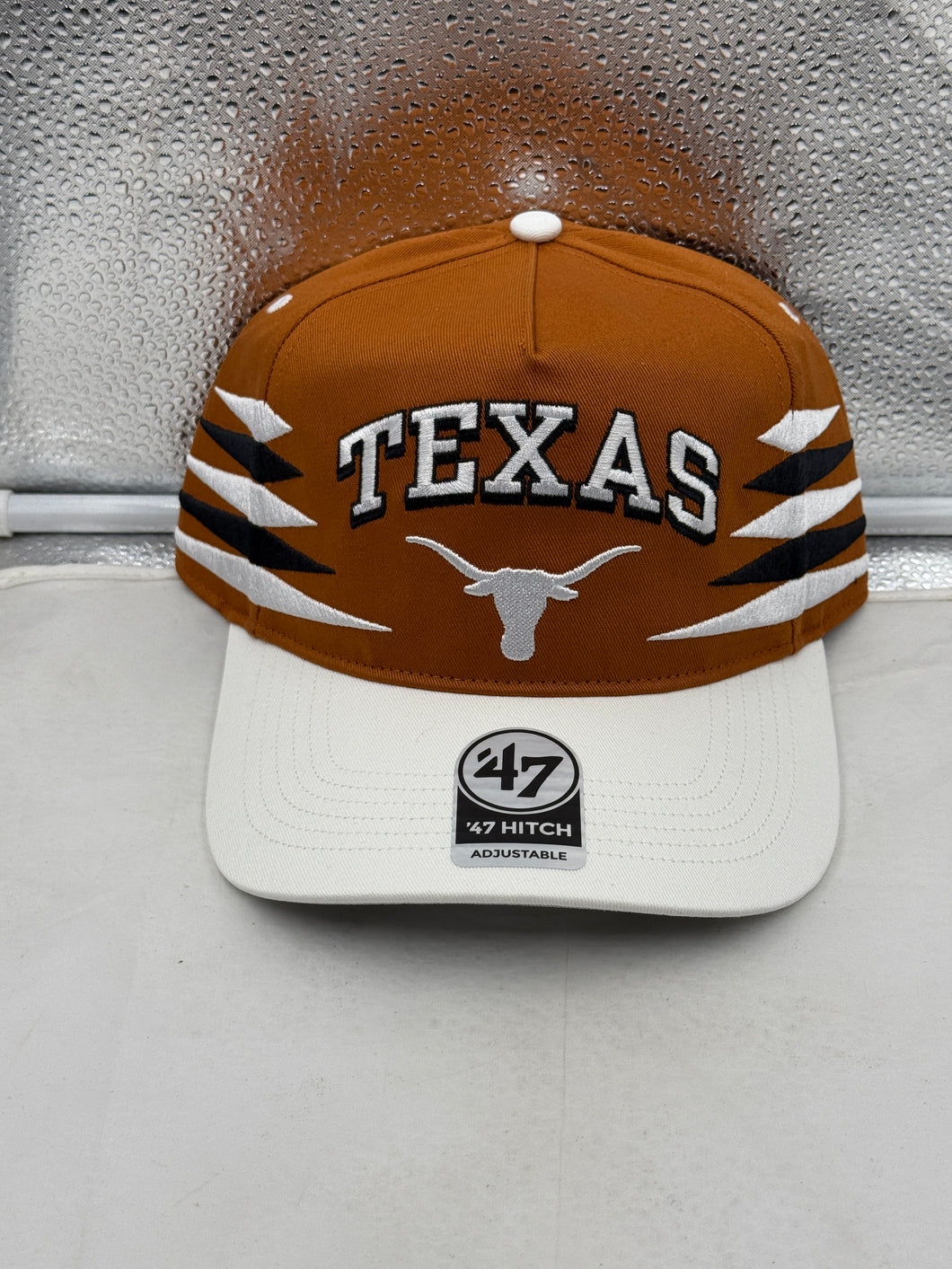 Texas Longhorns NCAA '47 Brand Orange Diamond Hitch Snapback Adjustable Hat displayed on a mannequin showcasing its sporty and stylish design.