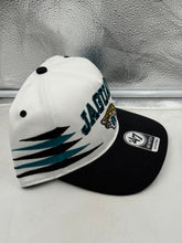Load image into Gallery viewer, Jacksonville Jaguars NFL &#39;47 Brand White Diamond Hitch Snapback Adjustable Hat showcasing the iconic team logo and diamond hitch pattern for stylish game day support.
