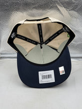 Load image into Gallery viewer, Lifestyle image of a person wearing the Michigan Wolverines NCAA '47 Orange Bowl Natural TT Hitch Snapback Hat, showcasing style for Michigan Wolverines hat supporters.
