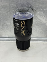 Load image into Gallery viewer, Showcasing the New Orleans Saints Tumbler, this stylish 30oz black mug is perfect for fans and is designed to keep drinks hot or cold.
