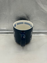 Load image into Gallery viewer, Close-up of the Detroit Lions 15oz Blue Coffee Mug, highlighting the durable ceramic material and prominent team logo.
