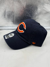 Load image into Gallery viewer, Close-up of Chicago Bears NFL '47 Brand Navy Blue Clean Up Adjustable Strapback Hat, highlighting the iconic team logo. Essential Chicago Bears hat for fans.
