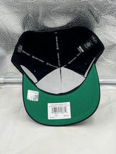 Load image into Gallery viewer, Packers Vs Patriots 1996 Super Bowl Dueling NFL &#39;47 Black Hitch Adjustable Hat worn outdoors, showcasing team spirit and comfort.
