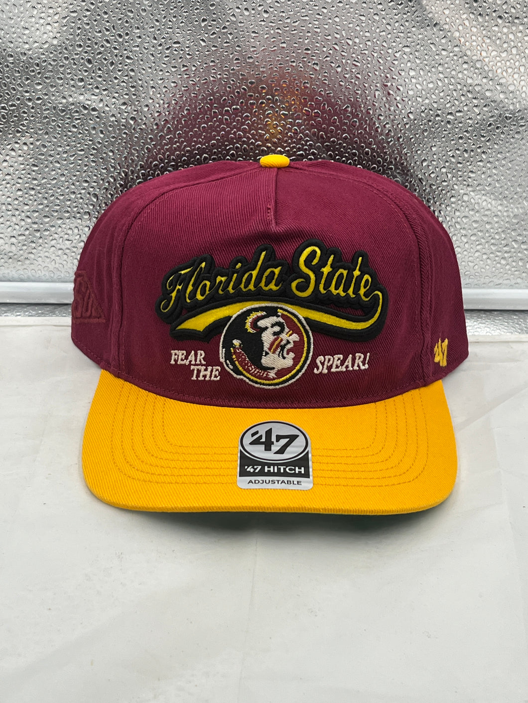 Florida State Seminoles FSU NCAA '47 Throwback Red Hitch Adjustable Snapback Hat displayed in a stylish angle, showcasing its classic design and adjustable snapback feature.