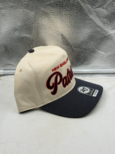 Load image into Gallery viewer, Flat lay of the New England Patriots hat, emphasizing its natural color and stylish design for dedicated fans.
