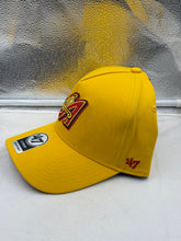 Load image into Gallery viewer, Model wearing the Los Angeles Angels MLB '47 Brand Throwback Yellow MVP Adjustable Snapback Hat on game day, demonstrating the comfort and adjustable fit of this stylish Los Angeles Angels hat.
