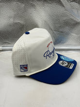 Load image into Gallery viewer, New York Rangers hat worn by a fan at a game, showcasing the NHL '47 Brand Off White Rope Hitch Adjustable Snapback design, ideal for game days and casual outings.
