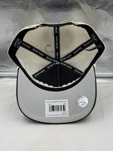 Load image into Gallery viewer, Lifestyle image of a person wearing the New York Yankees MLB '47 Brand Blue Hitch Mesh Adjustable Snapback Hat, perfect for game days and casual outings.
