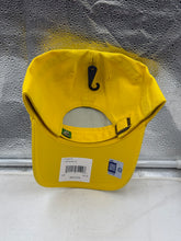Load image into Gallery viewer, Oregon Ducks NCAA '47 Brand Throwback Yellow Clean Up Adjustable Strapback Hat displayed on a person's head, exemplifying casual game-day fashion.
