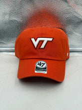 Load image into Gallery viewer, Virginia Tech Hokies NCAA '47 Brand Orange Clean Up Adjustable Strapback Hat displayed on a man, showcasing its vibrant orange color and classic style.

