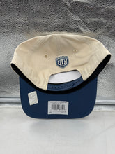 Load image into Gallery viewer, The Colorado Avalanche NHL '47 Throwback Natural TT Hitch Adjustable Snapback Hat worn by a fan at a game, representing team spirit and style.

