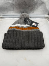 Load image into Gallery viewer, Close-up view of the Texas Longhorns NCAA '47 Brand Dark Gray Winter Beanie Knit Ski Cap Hat featuring a snug fit design, perfect for cold weather, emphasizing team pride.
