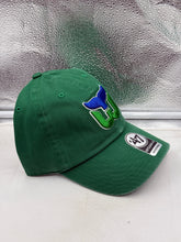 Load image into Gallery viewer, Close-up image of the Hartford Whalers NHL '47 Brand Throwback Green Clean Up Adjustable Hat's logo detail.
