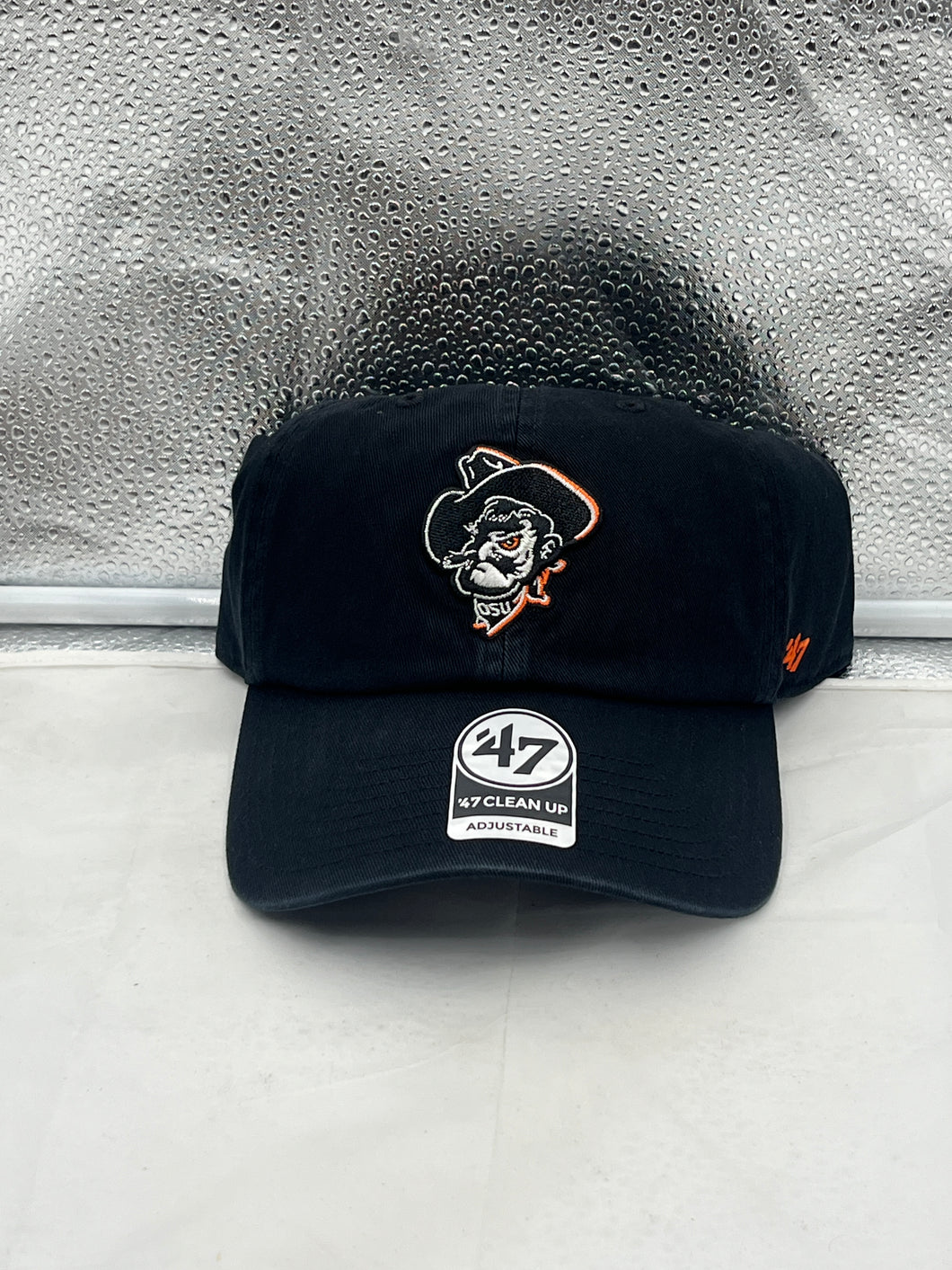 Oklahoma State Cowboys NCAA '47 Brand Throwback Black Clean Up Adjustable Hat showcasing the iconic Cowboys logo with a classic black design, perfect for fans and alumni.