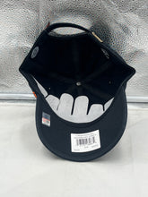 Load image into Gallery viewer, Oklahoma State Cowboys NCAA &#39;47 Brand Throwback Black Clean Up Adjustable Hat worn by a fan at a sporting event, highlighting team spirit and support.
