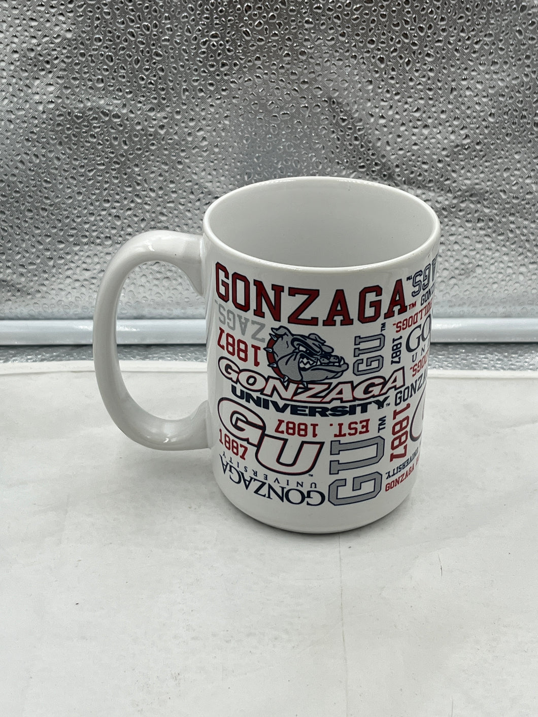 Gonzaga Bulldogs NCAA Spirit Style 15oz Coffee Mug Cup showing vibrant colors and logo by Logo Brands, perfect for showcasing school pride.