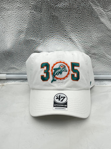 Miami Dolphins NFL '47 Throwback 305 White Clean Up Adjustable Strapback Hat displayed on a neutral background, showcasing the embroidered Dolphins logo and adjustable strap design.