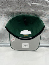 Load image into Gallery viewer, Lifestyle shot of a person wearing the Oakland Athletics MLB &#39;47 Brand Throwback Green MVP Adjustable Hat, representing team spirit at a baseball game.
