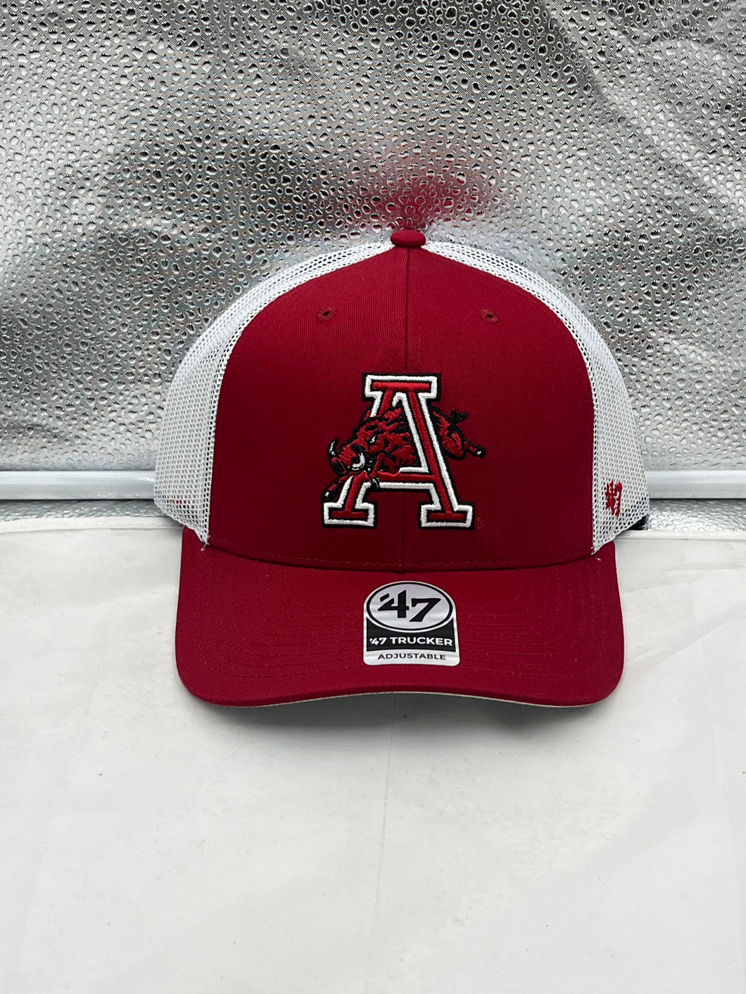 Arkansas Razorbacks NCAA '47 Brand Throwback Red Trucker Adjustable Snapback Hat displayed with vibrant red color and vintage design.