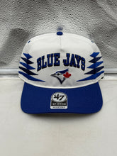 Load image into Gallery viewer, Front view of the Toronto Blue Jays MLB '47 Brand White TT Diamond Hitch Adjustable Snapback Hat showcasing the iconic team logo.
