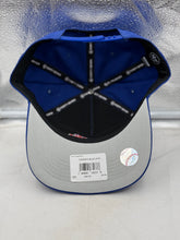 Load image into Gallery viewer, Man wearing the Toronto Blue Jays MLB '47 Brand Blue Hitch Adjustable Snapback Hat, representing team loyalty at a sports event.
