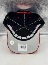 Load image into Gallery viewer, Lifestyle image of a person wearing the Washington Nationals MLB '47 Brand Navy TT Diamond Hitch Adjustable Snapback Hat while enjoying a day at the ballpark.

