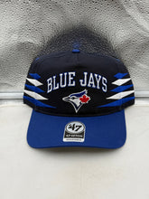 Load image into Gallery viewer, Toronto Blue Jays MLB '47 Brand Blue TT Diamond Hitch Adjustable Snapback Hat displayed at an angle showcasing its stylish blue design and team logo.
