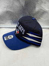 Load image into Gallery viewer, Close-up view of the Toronto Blue Jays MLB '47 Brand Blue TT Diamond Hitch Adjustable Snapback Hat highlighting the texture and quality fabric.
