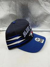 Load image into Gallery viewer, Toronto Blue Jays MLB '47 Brand Blue TT Diamond Hitch Adjustable Snapback Hat styled with casual clothing, perfect for game day and fan attire.
