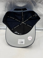 Load image into Gallery viewer, Model wearing the New York Yankees MLB '47 Brand Navy Hitch Adjustable Snapback Hat demonstrating its stylish design for casual outings.
