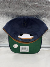 Load image into Gallery viewer, Close-up of the Atlanta Braves MLB '47 Brand Throwback Navy Hitch Adjustable Snapback Hat highlighting the quality materials and stitching.
