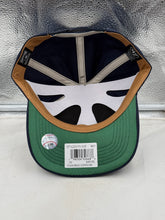 Load image into Gallery viewer, Atlanta Braves MLB '47 Brand Throwback Navy Hitch Adjustable Snapback Hat resting on a table, showcasing the classic navy color and vintage style.
