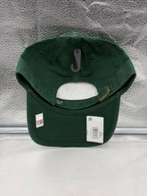 Load image into Gallery viewer, The South Florida Bulls USF NCAA '47 Brand Green Clean Up Adjustable Strapback Hat worn casually outdoors, showcasing its fit and comfort.

