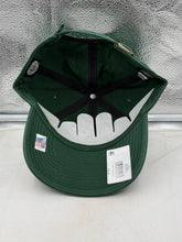 Load image into Gallery viewer, Person holding the South Florida Bulls USF NCAA '47 Brand Green Clean Up Adjustable Strapback Hat, emphasizing its versatility and fan spirit.
