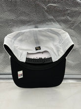 Load image into Gallery viewer, UCF Knights hat worn by a fan at a game, highlighting team pride and casual sporty style.
