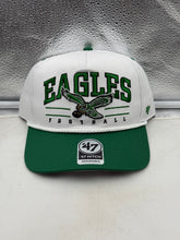 Load image into Gallery viewer, Philadelphia Eagles NFL '47 Throwback White Hitch Rope Snapback Adjustable Hat displayed on a wooden surface with a green background.
