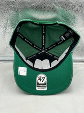 Load image into Gallery viewer, a green and black hat with white teeth
