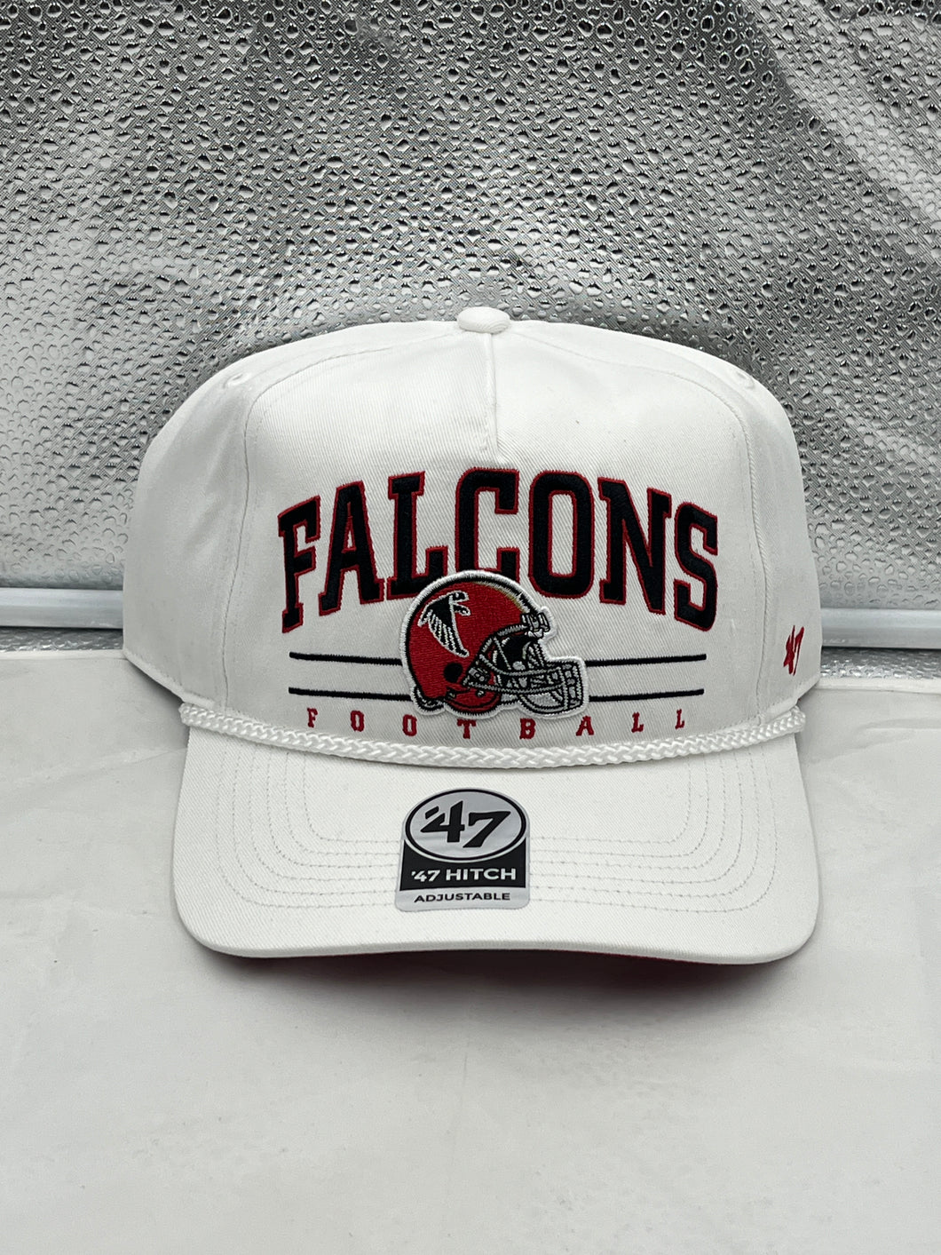 a white hat with the words falcons on it