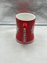 Load image into Gallery viewer, a red coffee mug with a white handle
