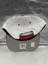 Load image into Gallery viewer, Lifestyle shot featuring a person wearing the Chicago Blackhawks NHL '47 Brand White TT Hitch Rope Adjustable Snapback Hat, perfect for representing the Chicago Blackhawks hat at any casual event.
