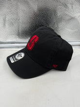 Load image into Gallery viewer, Close-up view of the Stanford Cardinal NCAA '47 Brand Black Clean Up Adjustable Strapback Hat featuring the iconic Stanford Cardinal logo, a must-have for any fan.
