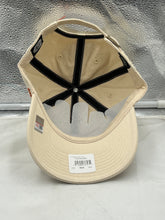 Load image into Gallery viewer, Texas Longhorns NCAA &#39;47 Brand Natural Clean Up Adjustable Strapback Hat displayed on a wooden surface, showcasing its stylish design and iconic logo, perfect for fans supporting their team.
