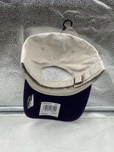 Load image into Gallery viewer, Side view of the Anaheim Ducks NHL &#39;47 Brand Throwback Natural Two Tone Clean Up Adjustable Hat featuring the adjustable strap and structured design.
