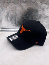 Load image into Gallery viewer, Close-up of the Texas Longhorns NCAA &#39;47 Brand Black Clean Up Adjustable Strapback Hat highlighting the adjustable strapback feature for a perfect fit.
