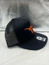 Load image into Gallery viewer, Texas Longhorns NCAA &#39;47 Brand Black Foam Trucker Mesh Adjustable Snapback Hat styled on a person at a game celebrating team spirit.
