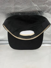 Load image into Gallery viewer, Miami Hurricanes hat displayed on a model, highlighting how it complements game day attire and supports team spirit.
